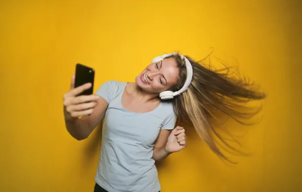 Smile, music, movement, dance, music, headphones, yellow background, gadget