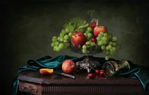 Apples, glass, grapes, peaches, cherry