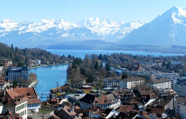 Picture the sky, snow, trees, landscape, mountains, bridge, lake, street