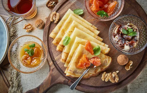 Honey, nuts, pancakes, apricots