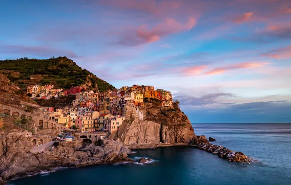 Sea, the sky, clouds, the city, stones, rocks, shore, coast