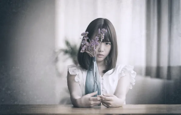 Picture sadness, bouquet, Oriental girl