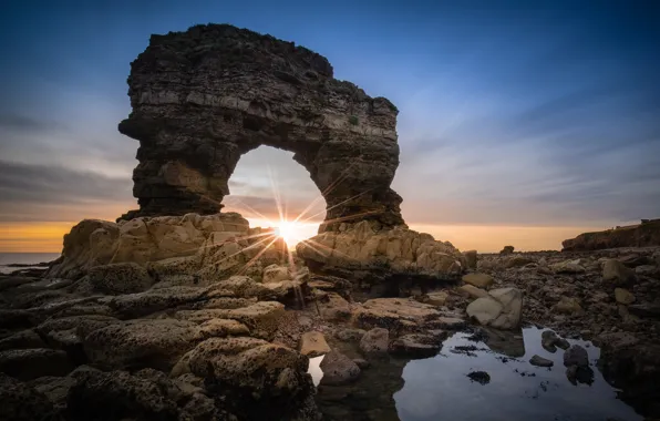 Sea, rocks, arch