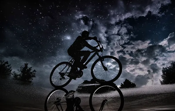 The sky, clouds, night, reflection, puddle, cyclist