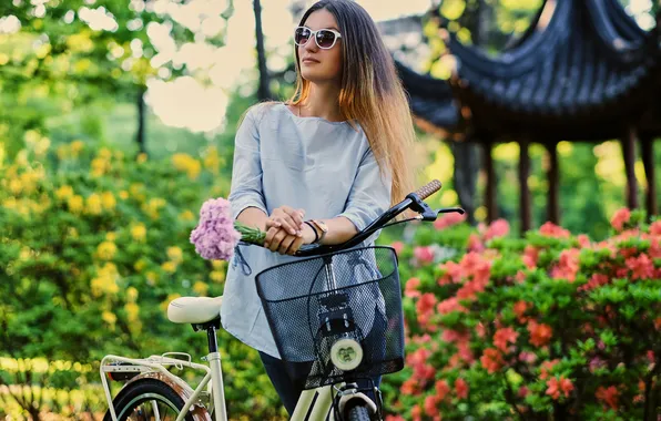 Girl, bike, basket, glasses