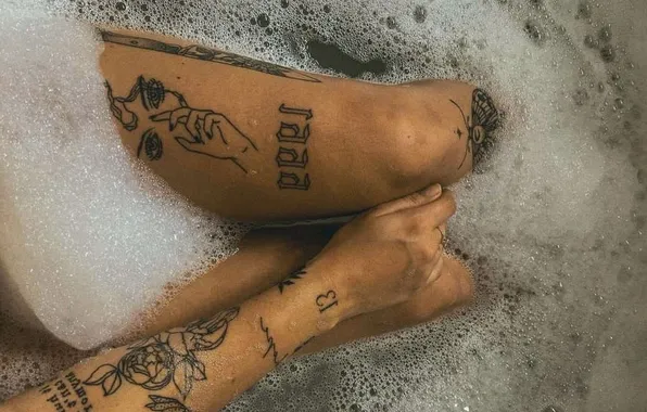 Foam, water, girl, bath, ring, slender legs, tattoos on the legs