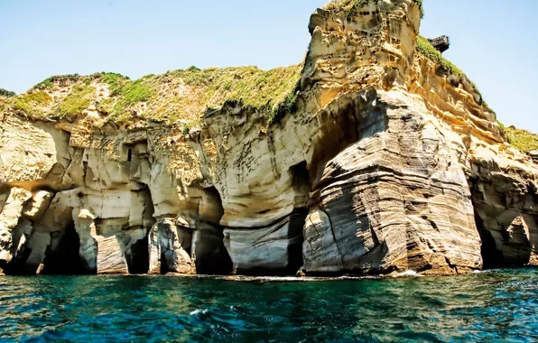 Sea, rock, grottoes