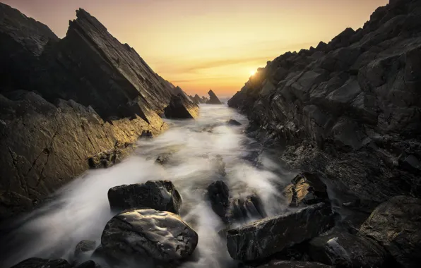 Water, the sun, stones, rocks