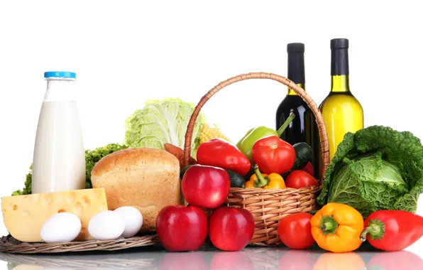 Wine, basket, apples, eggs, cheese, milk, bread, white background