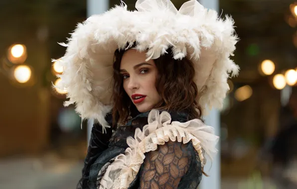 Picture Natalie Tychynska, photographer Tanya Markova, in hat with feathers