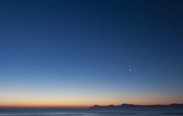 The sky, night, a month, twilight