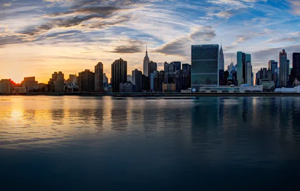 The sky, the sun, clouds, the city, dawn, shore, building, home