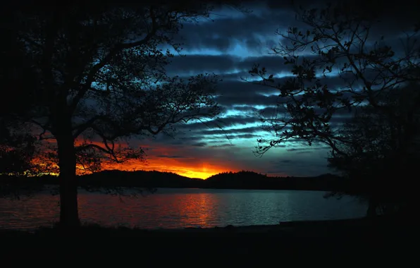 Picture the sky, clouds, trees, sunset, lake, hills, glow