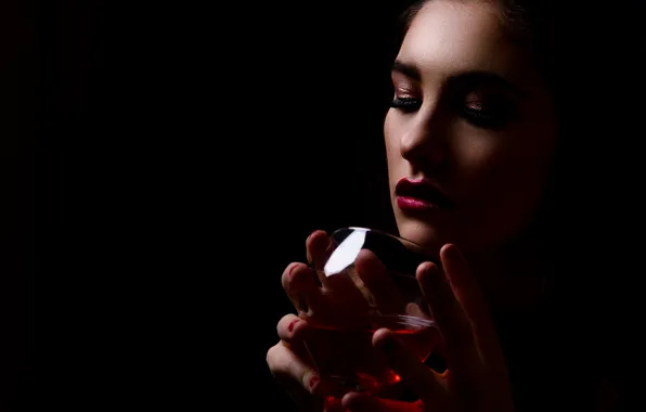 Picture girl, wine, glass, the dark background