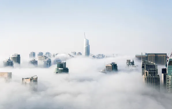 Clouds, fog, skyscraper