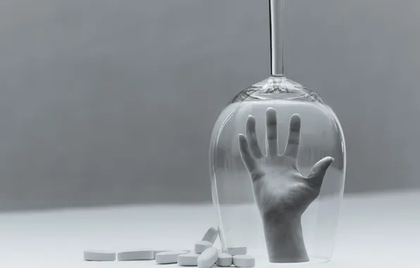 Picture glass, hand, pills