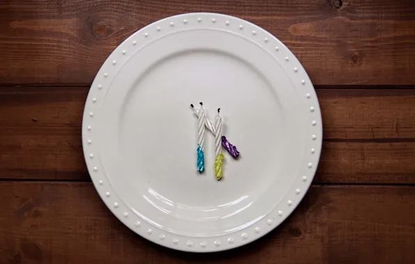 Table, candles, plate