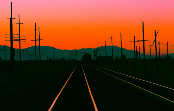 Mountains, posts, rails, silhouette, glow