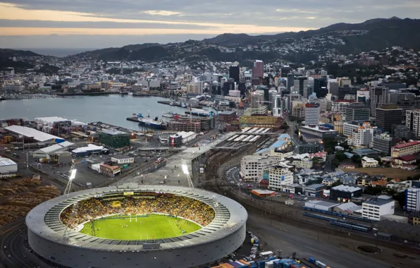 The city, twilight, stadium, urban traffic