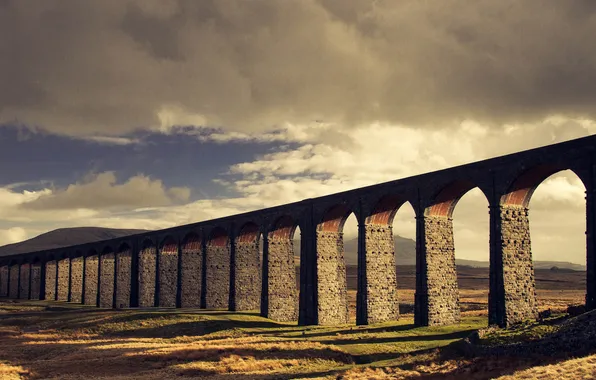 Hills, shadows, viaduct