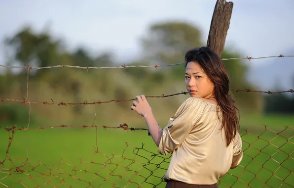 Girl, the fence, Asian