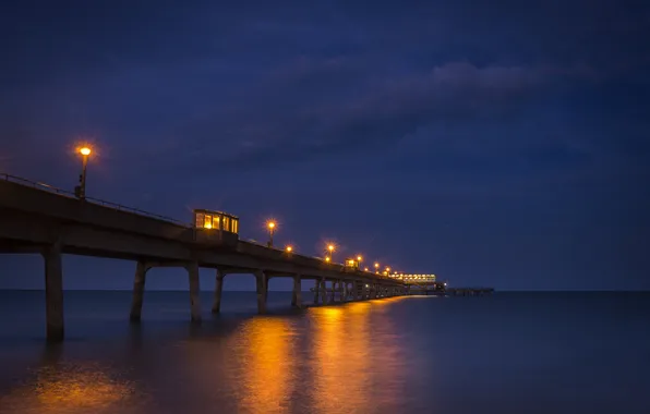 Picture the sky, clouds, bridge, lights, the ocean, the evening