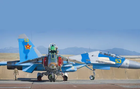 Picture fighters, Parking, the airfield, taxiing, su-27UB, the MiG-27, air force Kazakhstan