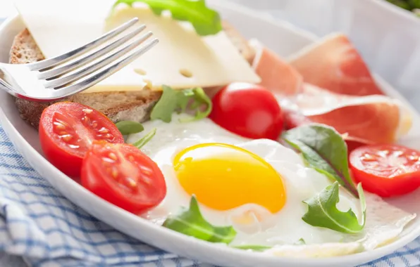 Plate, fork, Fried eggs with tomatoes