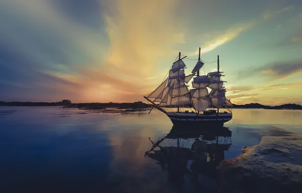 The sky, clouds, reflection, shore, ship, sailboat, sails, twilight