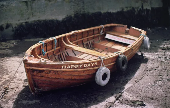 The inscription, boat, tires