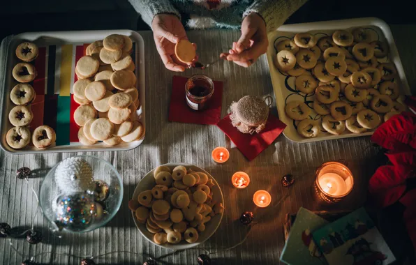 Light, table, holiday, candles, hands, cookies, plate, Christmas