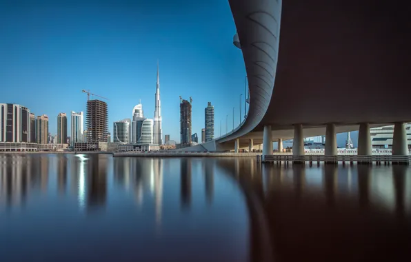 The sky, bridge, the city, reflection, posts, building, skyscrapers, tower