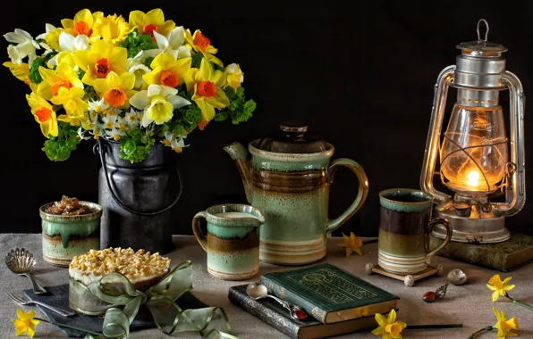 Picture books, lamp, cake, dishes, still life, daffodils