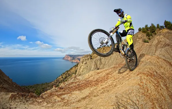 Picture sea, mountains, bike, rocks, coast, costume, gloves, helmet