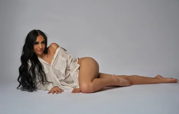 Picture look, smile, hair, brunette, lies, shirt, legs, cutie