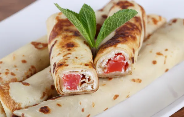 Pancakes, mint, cheese, rolls
