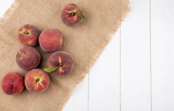 Board, light background, peaches, burlap