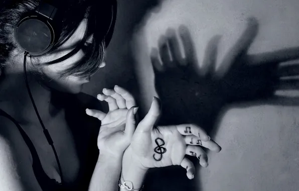 HANDS, SOUND, MUSIC, BROWN hair, HEADPHONES, Black and WHITE, WALL, NOTES