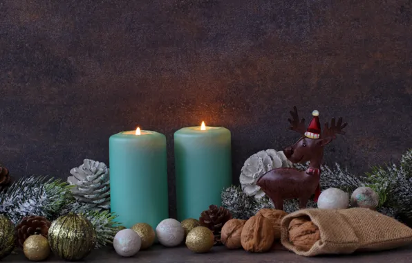 Picture holiday, new year, spruce, candles, nuts