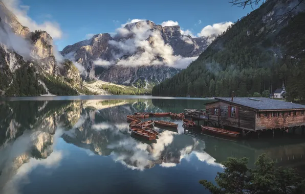 Mountains, boats, house