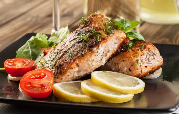 Greens, lemon, fish, tomatoes