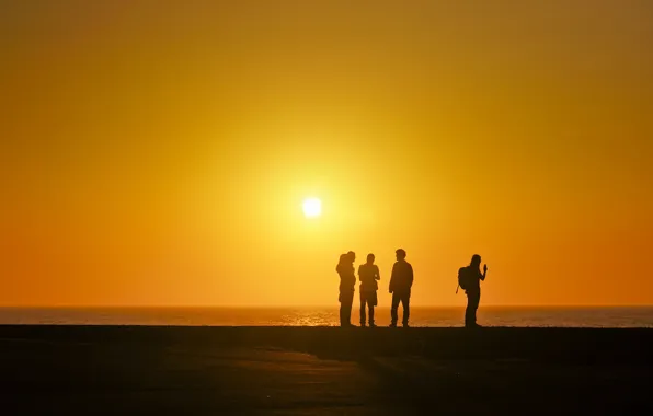 Picture sea, the sun, people, silhouette, orange sky