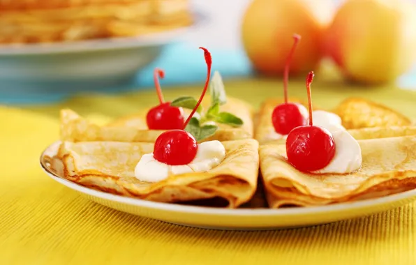 Cherry, cream, pancakes, mint leaves