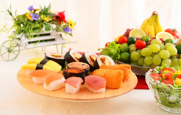 Fish, oranges, grapes, fruit, caviar, sushi, salad