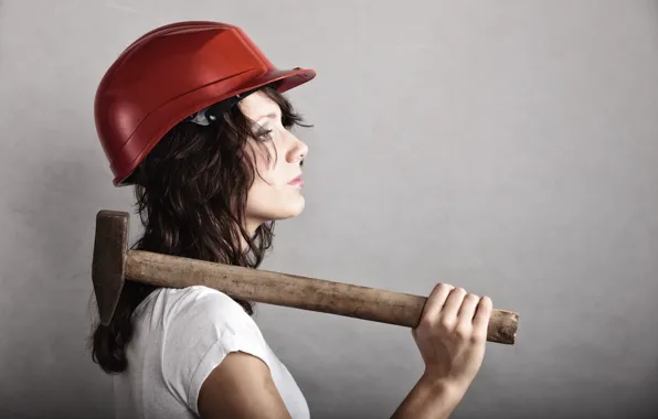 Woman, hammer, pearls, profile view