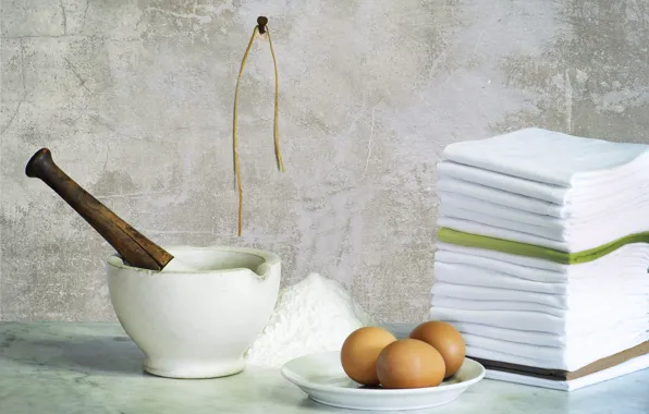 Eggs, stack, towels, nail, flour, mortar