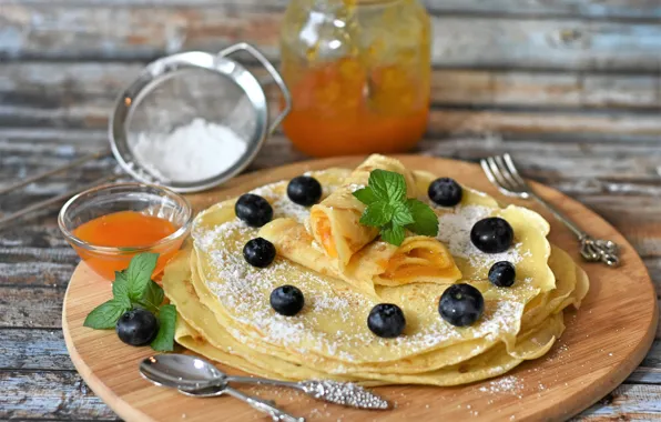 Blueberries, pancakes, jam