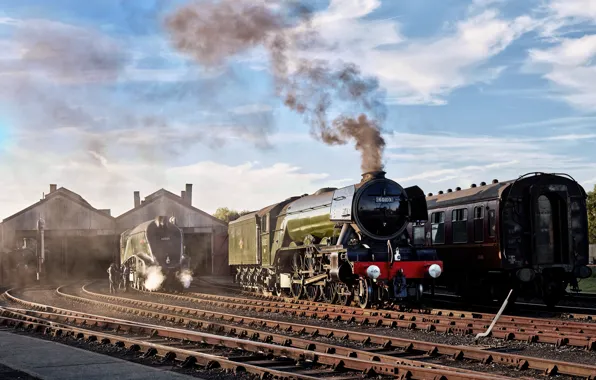 Smoke, rails, trains