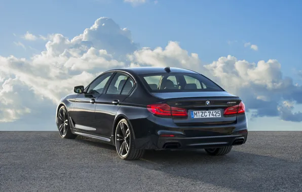 Picture the sky, clouds, black, shadow, BMW, Parking, sedan, rear view