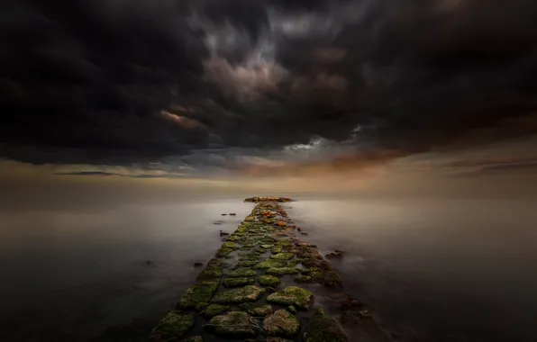 Picture sea, clouds, stones, track